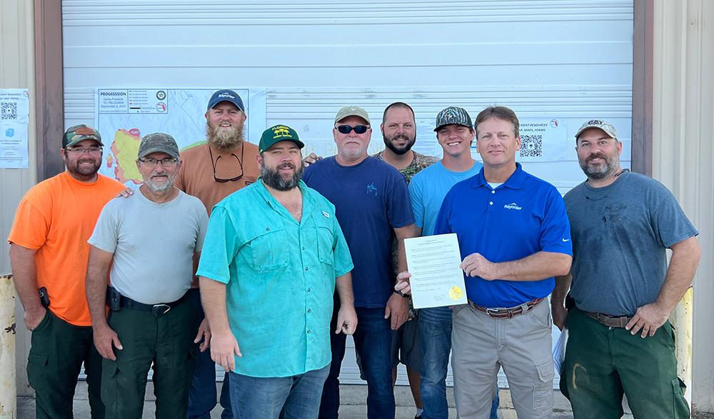 From left to right, the group includes Ethan Boatwright, Ray Howling, Matt Gibson, Judge Colt Christian, Andrew Register, Mike Stein, Jonathan Herrin, Billy Geier and Patrick Hughes.